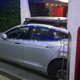 Illustration for article titled Tesla Model X Test Mule Is A Model S With Weights On The Roof